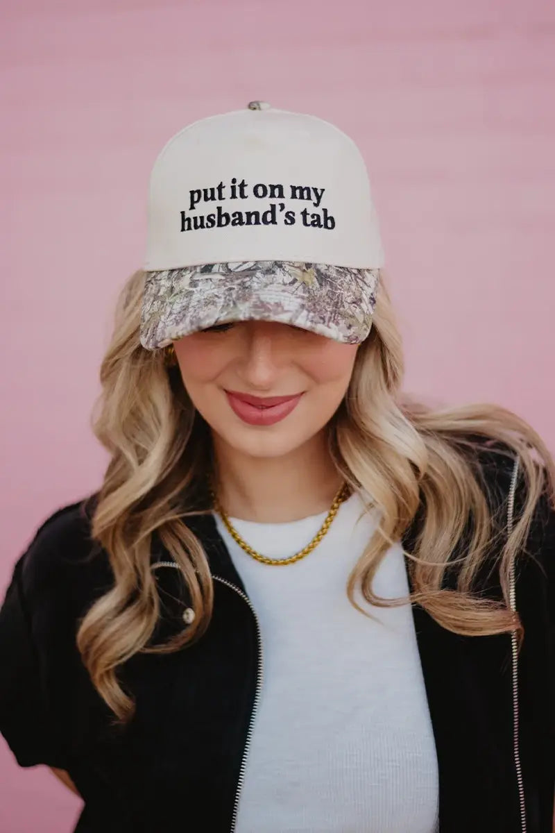 Put It On My Husband's Tab Trucker Hat