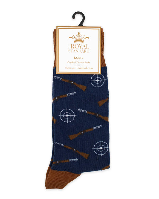 Navy sock with brown gun design on a hanger with 'Royal Standard' label.