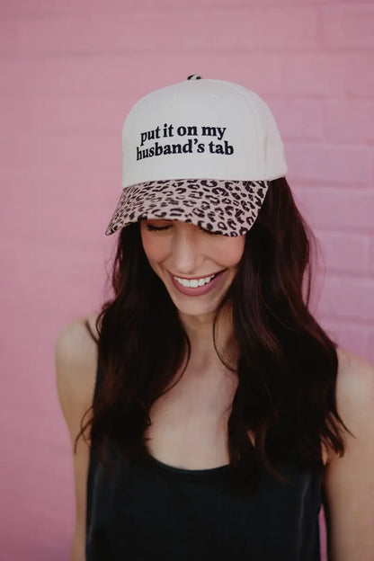 Put It On My Husband's Tab Trucker Hat